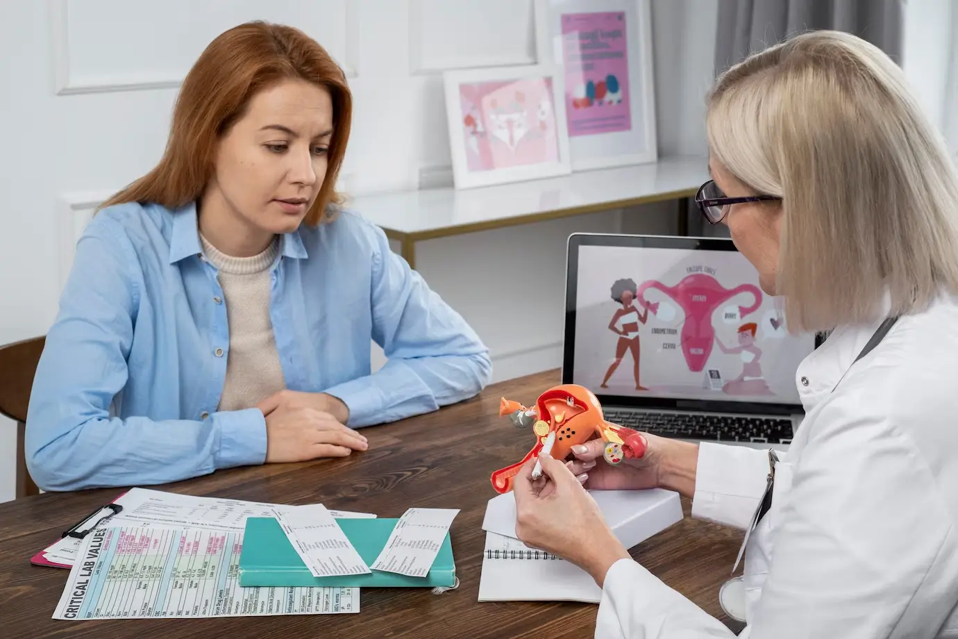 medium-shot-doctor-explaining-reproductive-system-model